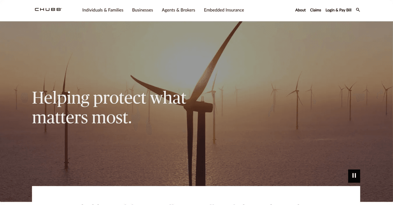 chubb homepage Wind turbines on water at sunset with the text "Helping protect what matters most." prominently displayed.