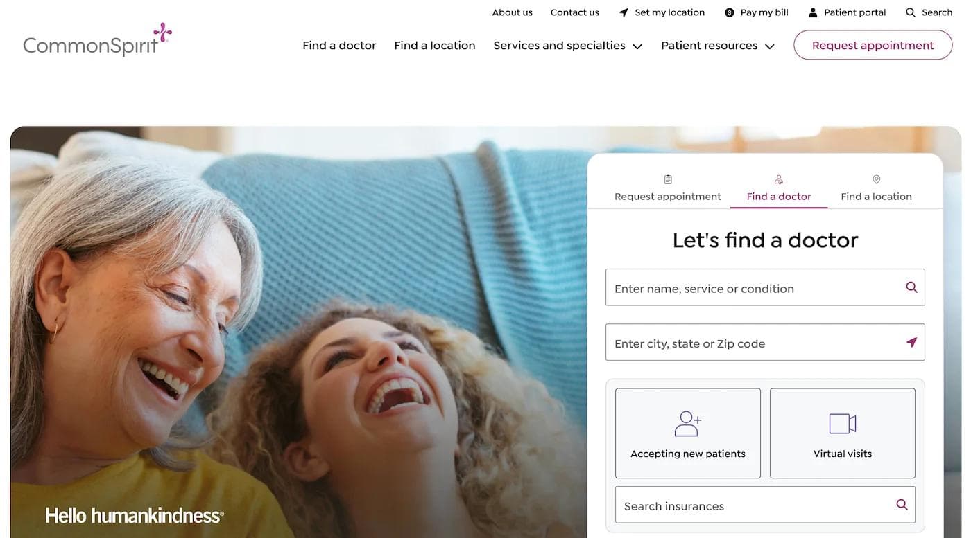 commonspirit hp Two women joyfully laughing together, with a website interface for finding doctors in the background.