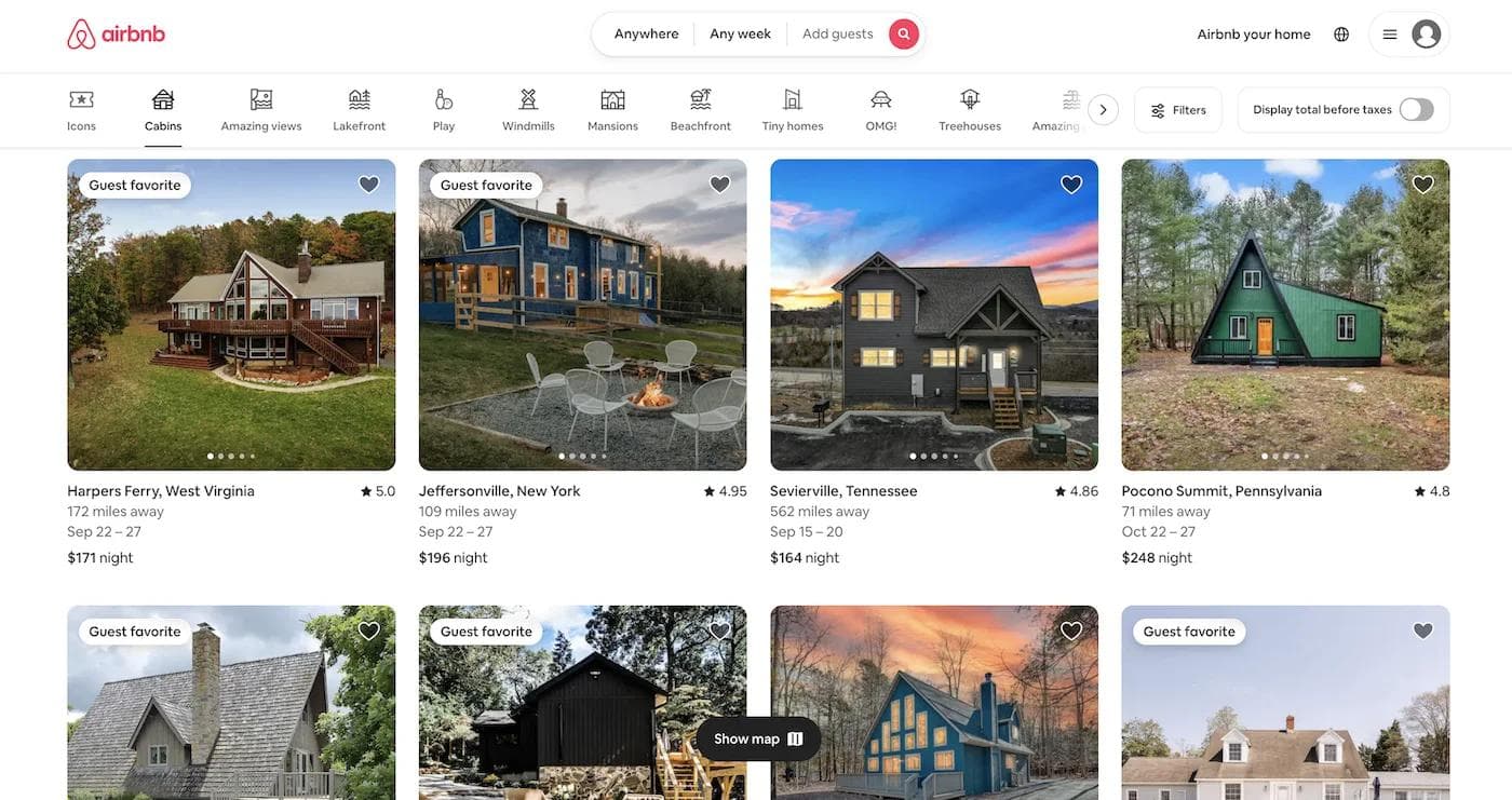 airbnb web design Airbnb listing showcasing various cabin rentals with details on locations, distances, ratings, and prices.