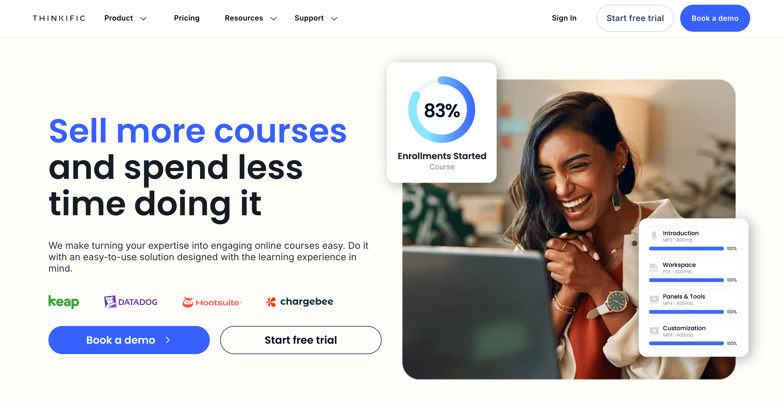 Smiling woman excitedly engaging with an online course platform showcasing course completion statistics.