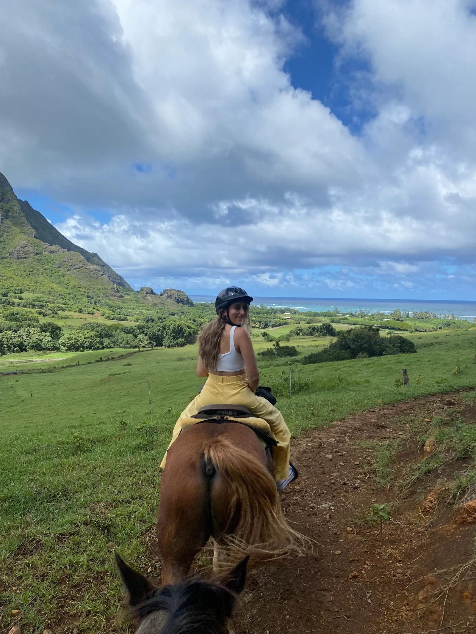 Natalie Qaqish horseback riding in Hawaii.